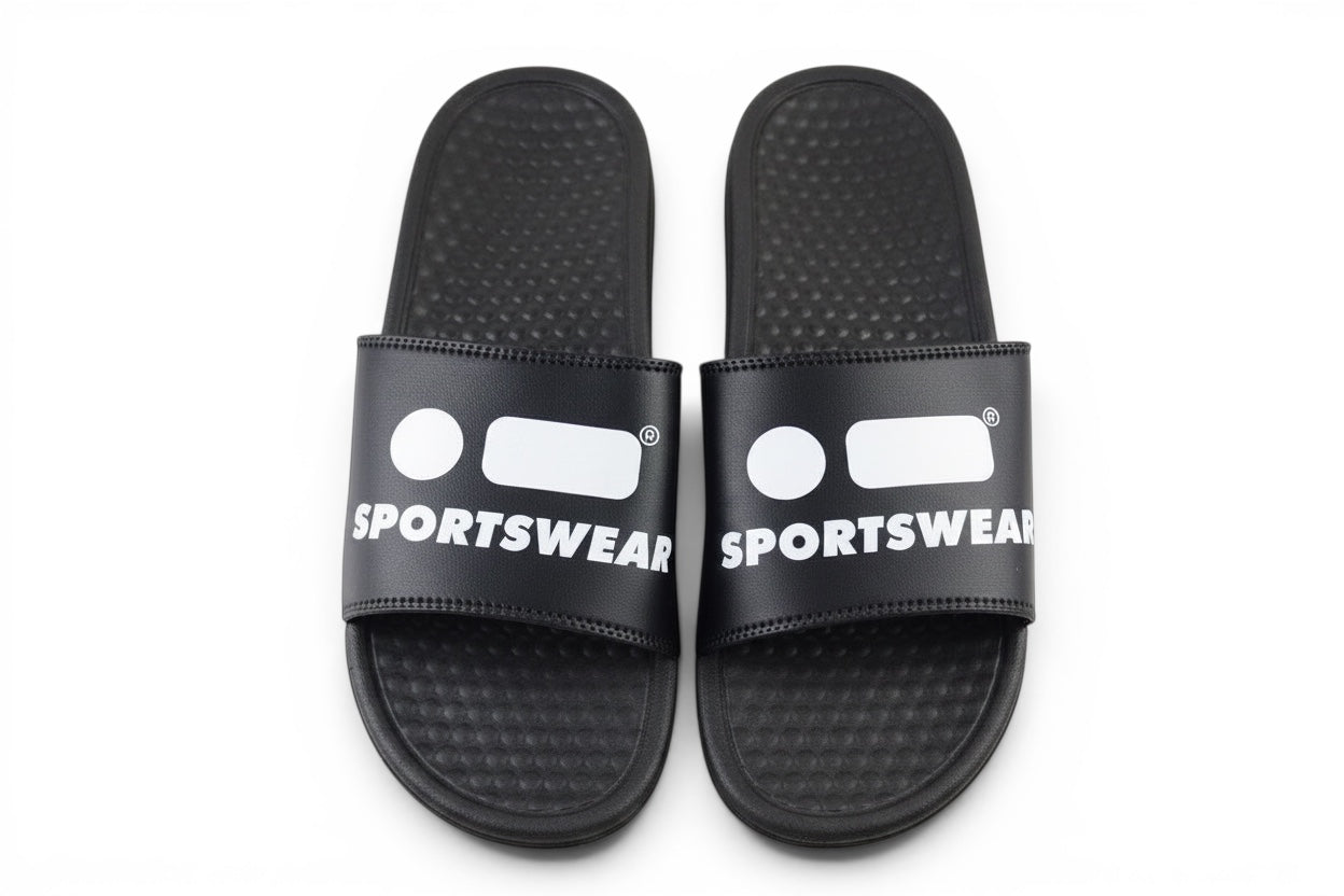 Robfrank.com black sports slides with white logo and text on the strap, featuring a comfortable textured footbed.